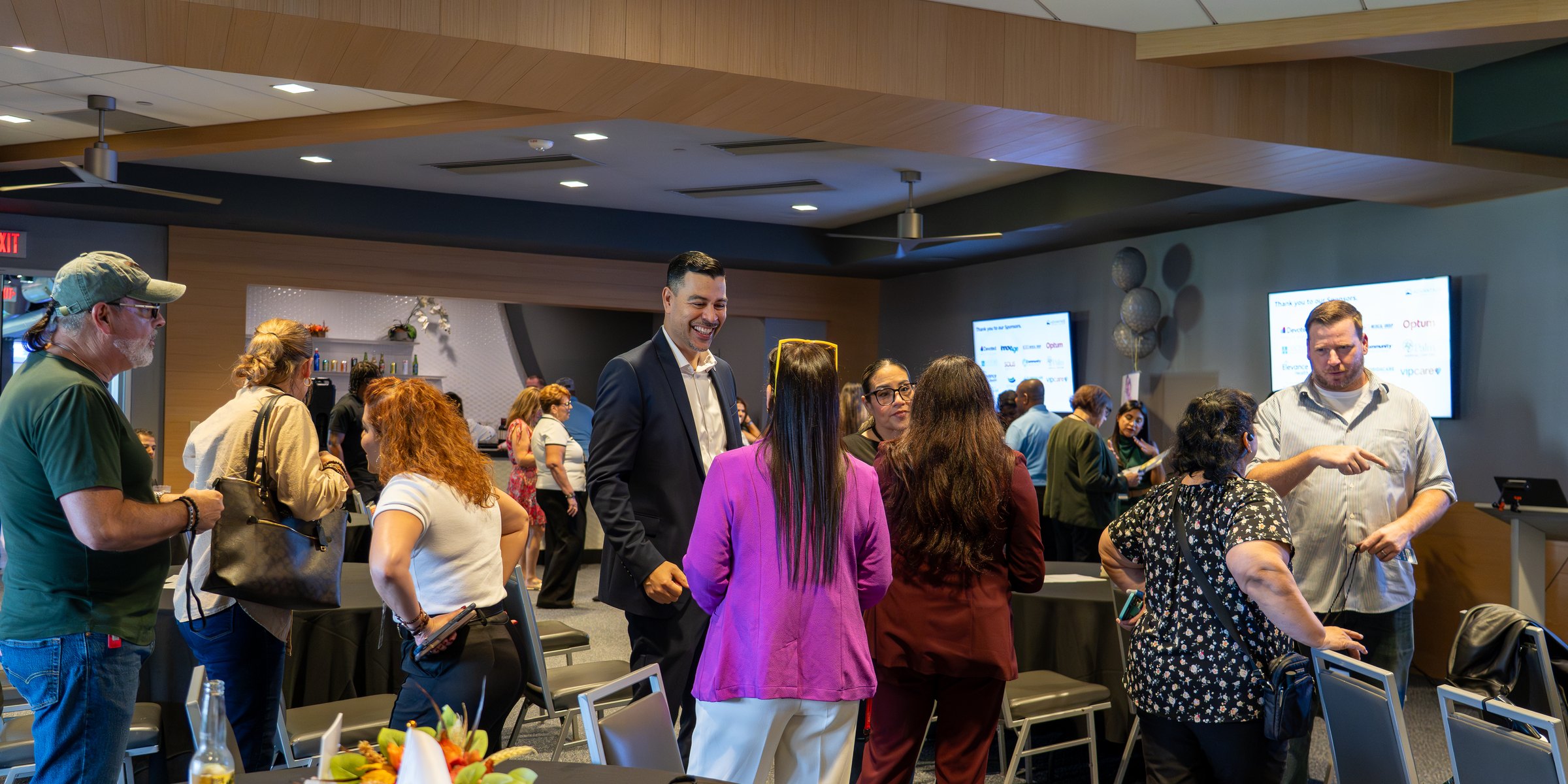 Agents and partners talking across the expo floor at the 2026 AEP event