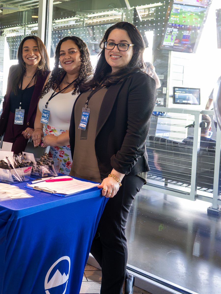 Three Advantage Insurance Advisors team members at the agency's booth during the 2026 AEP event